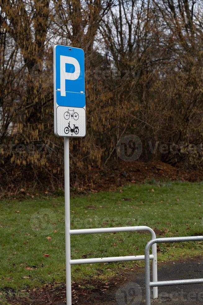 Sign for parking bicycles and motorcycles photo
