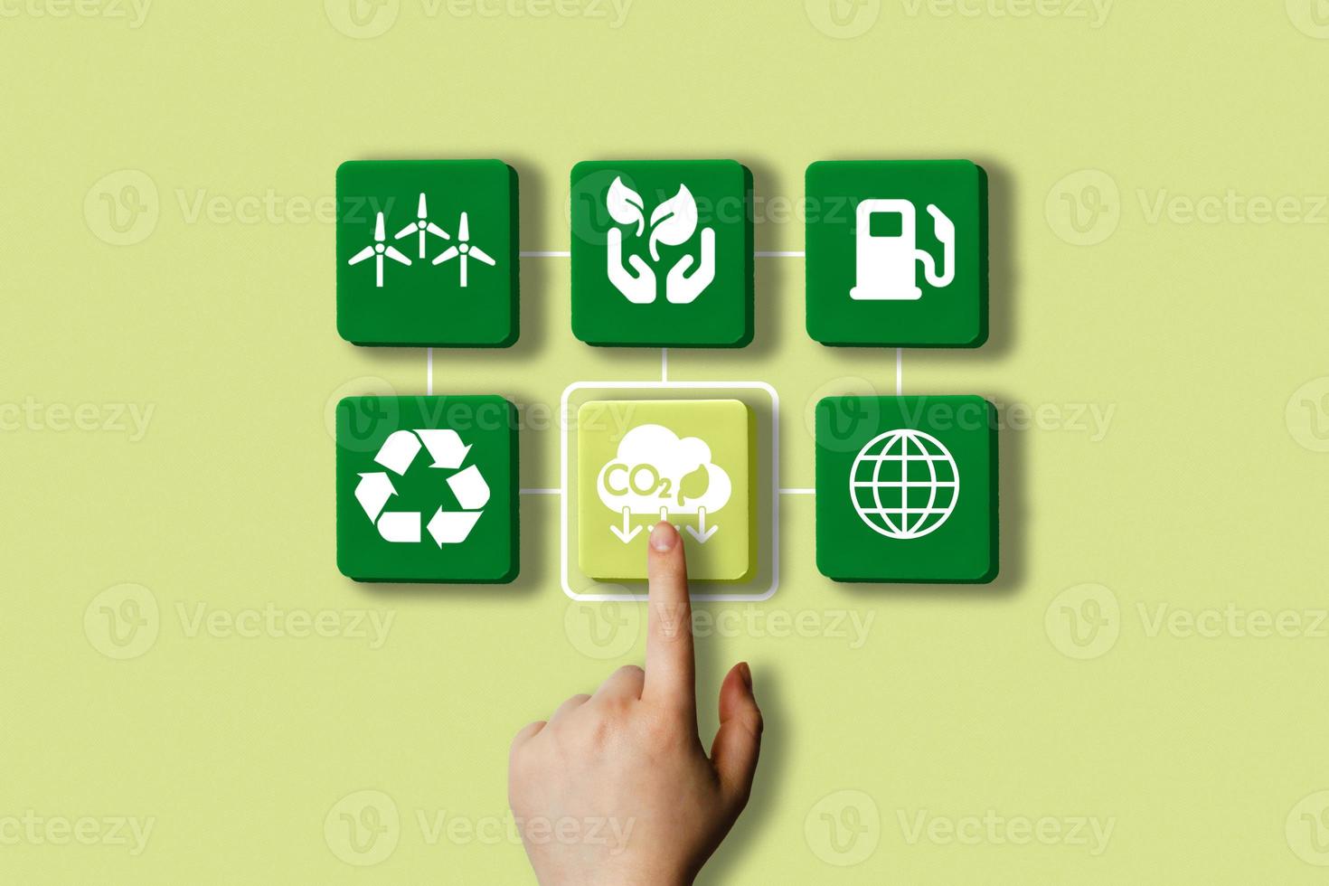 Woman hand choosing eco life interface. Reduce CO2 emissions to limit climate change and global warming concept. photo
