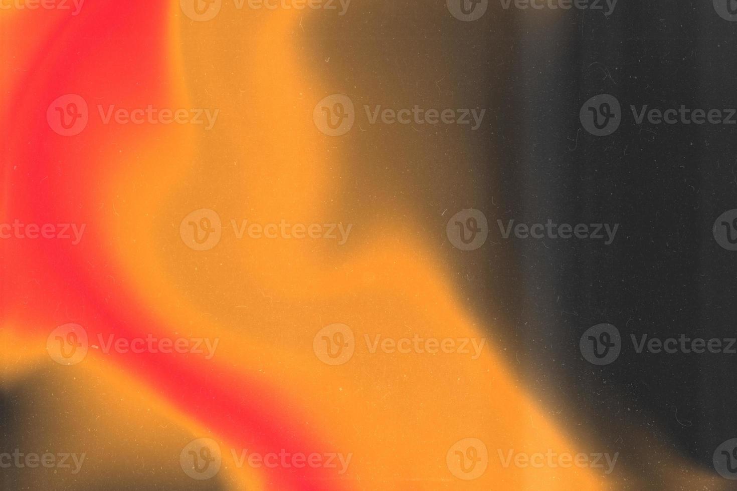Abstract retro grunge decorative relief with film dust texture and orange and red gradient colors. Rough colored illustration background. photo