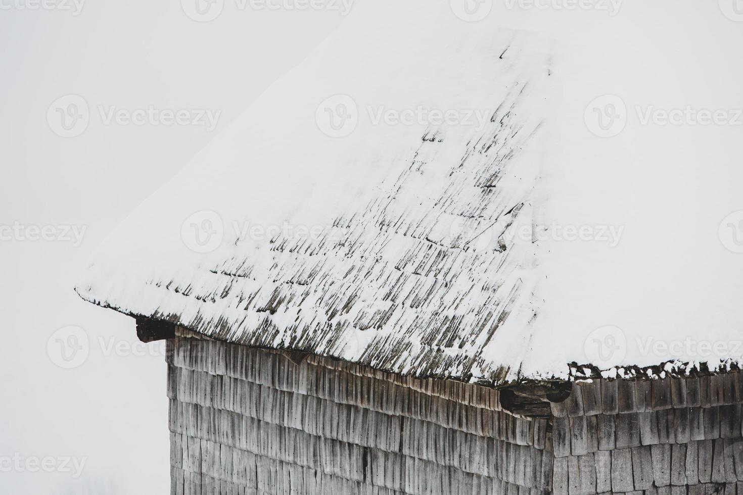 An abundant snowfall in the Romanian Carpathians in the village of Sirnea, Brasov. Real winter with snow in the country photo