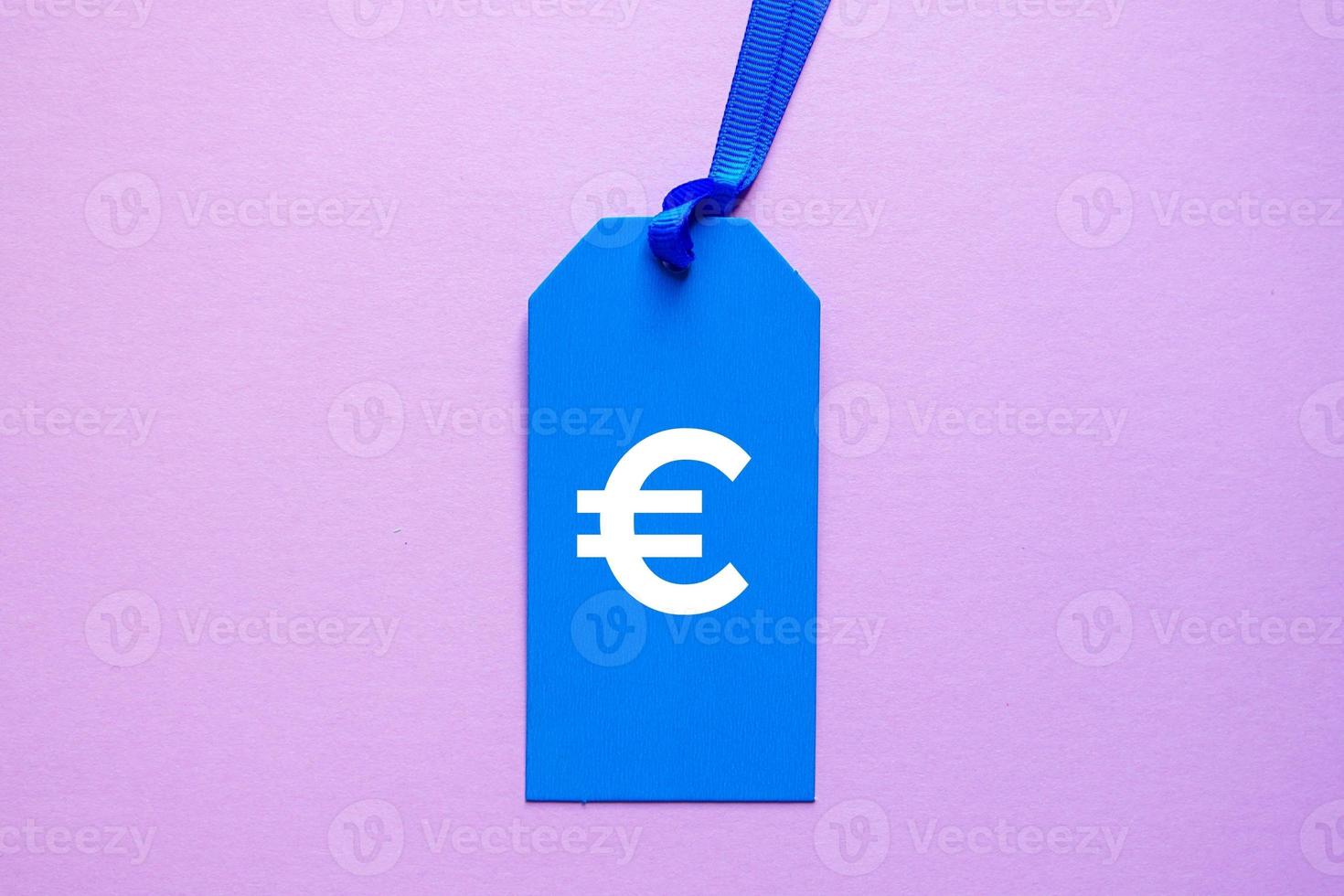 euro sign on the blue price tag for sales photo