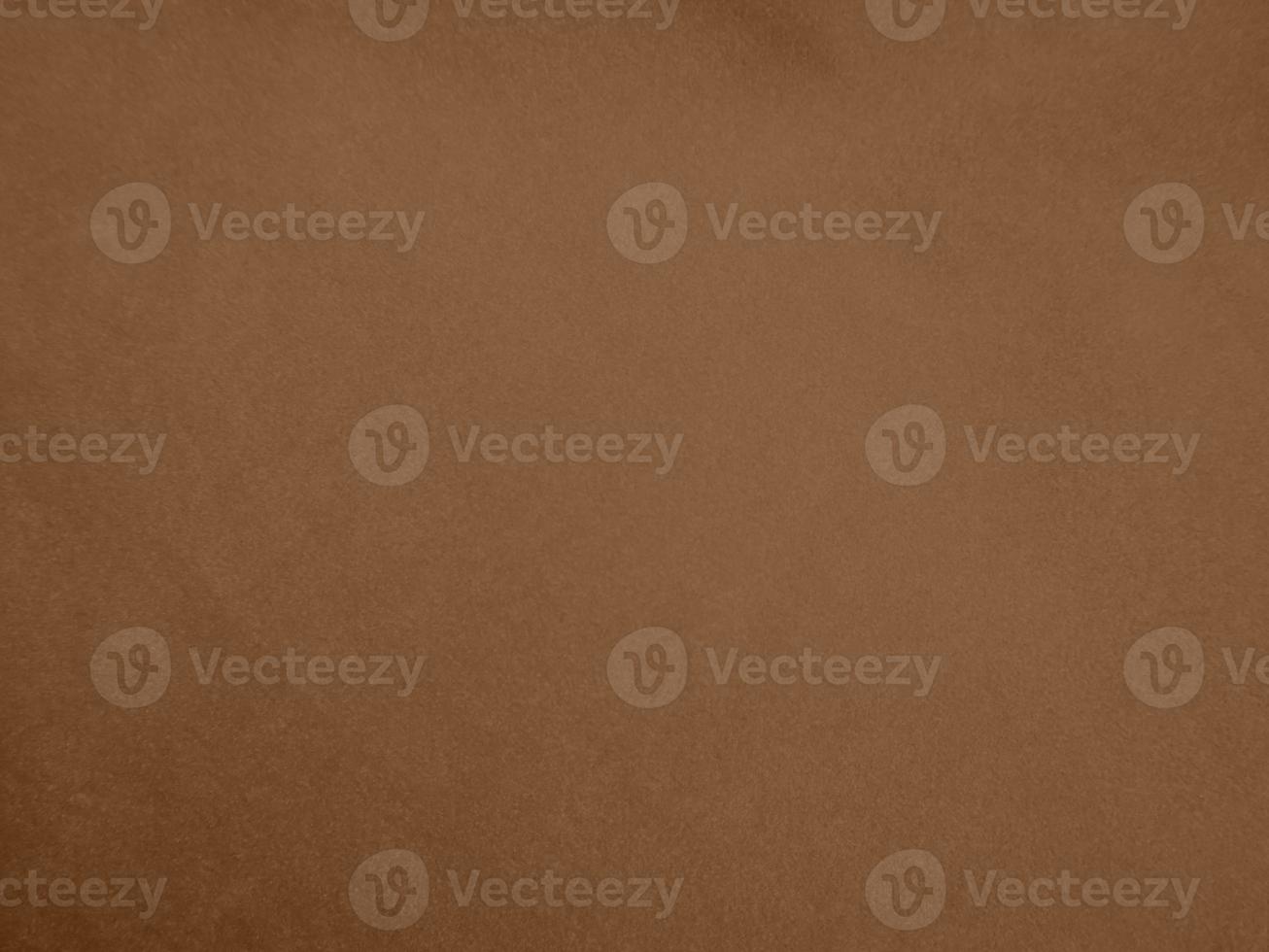 Brown color velvet fabric texture used as background. Empty brown fabric background of soft and