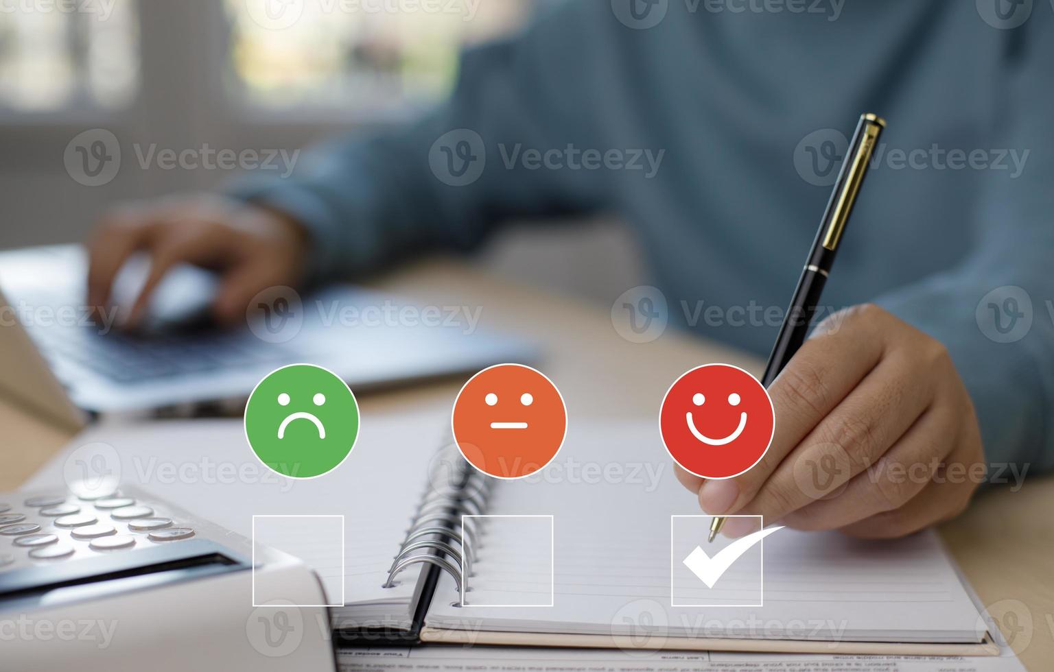 Businessman pressing smile on laptop keyboard customer service, evaluation concept,rating to service experience on online application, Customer review satisfaction feedback survey,Negative feedback photo