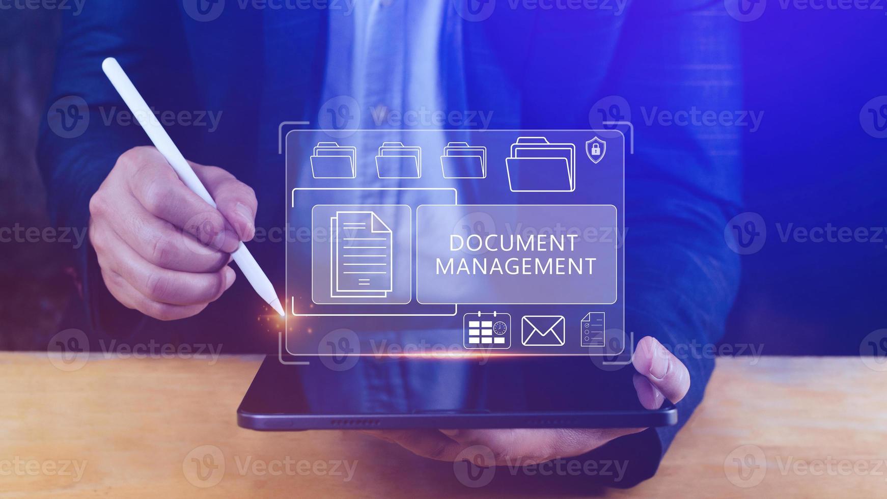 Document Management System DMS being setup IT consultant working on laptop computer in office, Software for archiving, searching and managing corporate files information photo