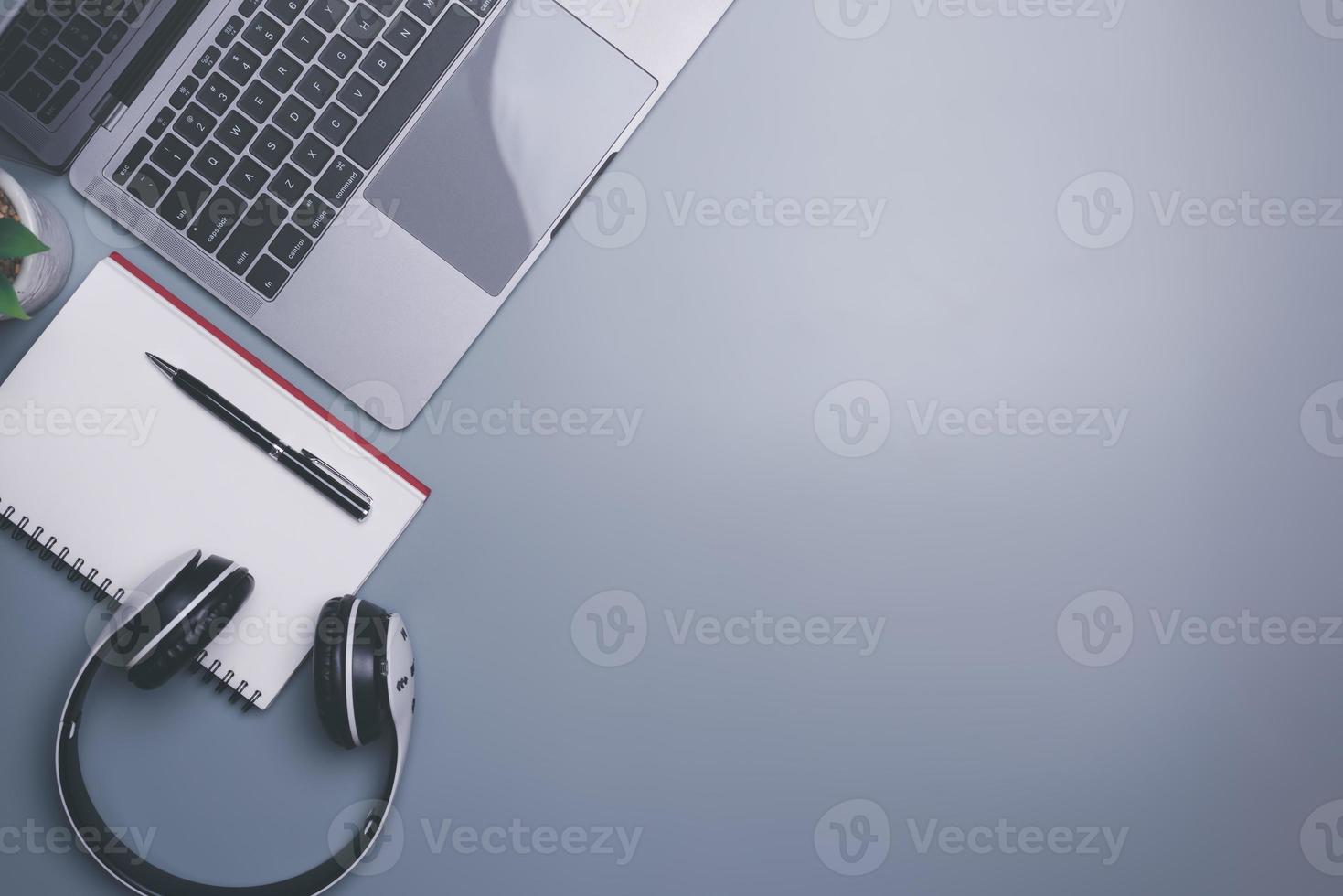 Headphones, notebooks, pens and laptops, Internet online education and learning concept, e-learning, learning new things, adding new career skills, personal development plan make business successful, photo