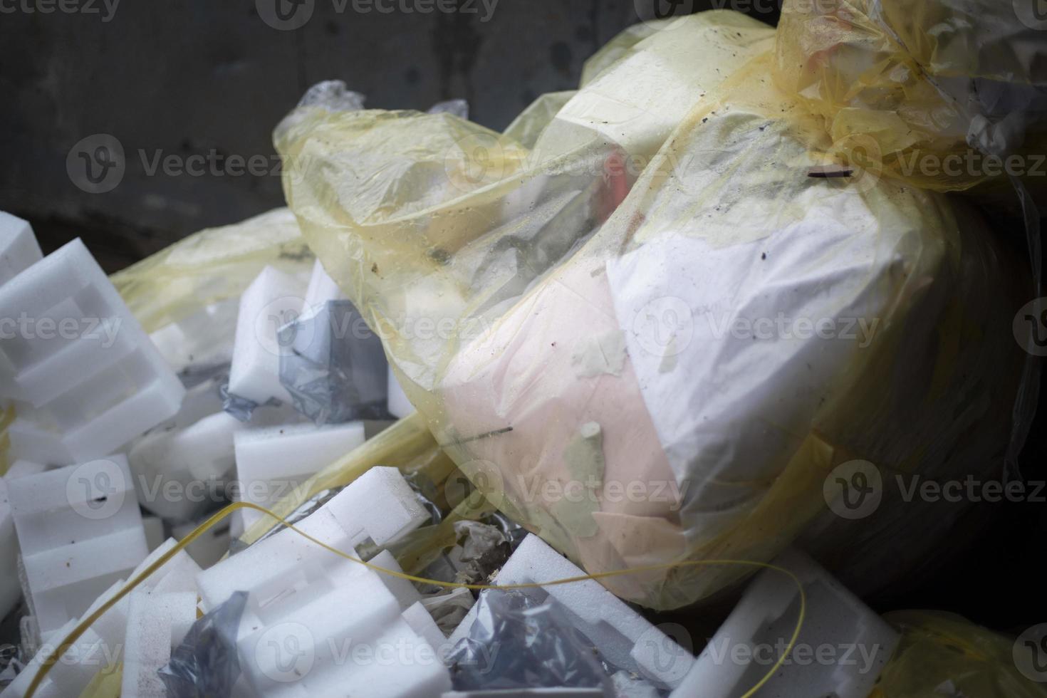 Garbage on street. Waste in bag. Residues from production. photo