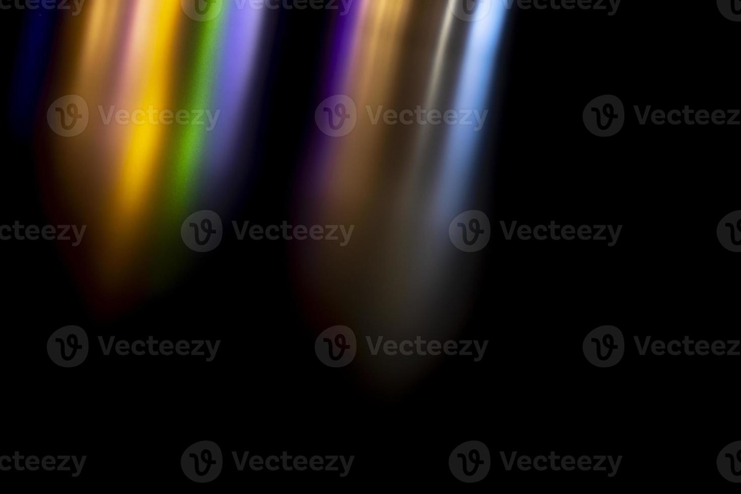 Abstract texture reflection of light. Colored background highlights in surface. Stripes of color turning to black. photo