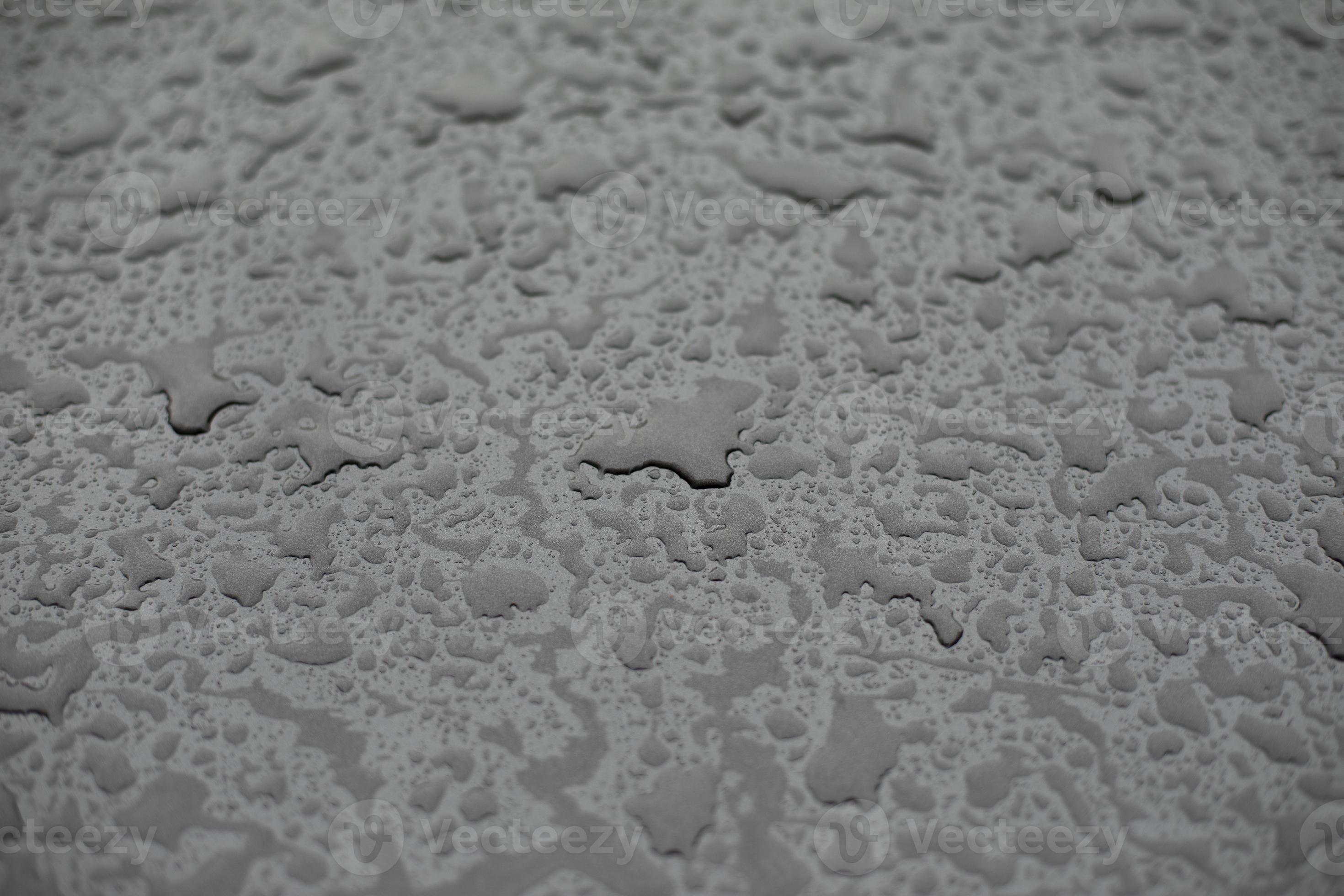 Raindrops on surface. Details of rain. Wet glass. 19772395 Stock Photo