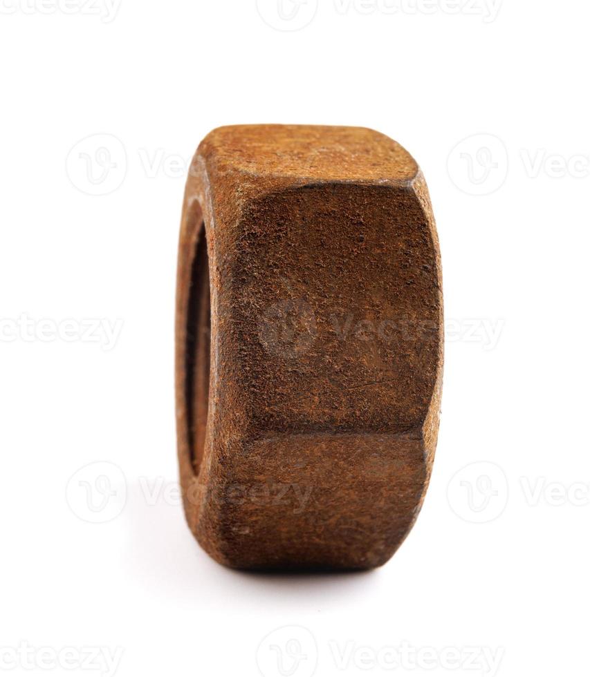 Old rusty nut isolated on white background. Full clipping path. photo