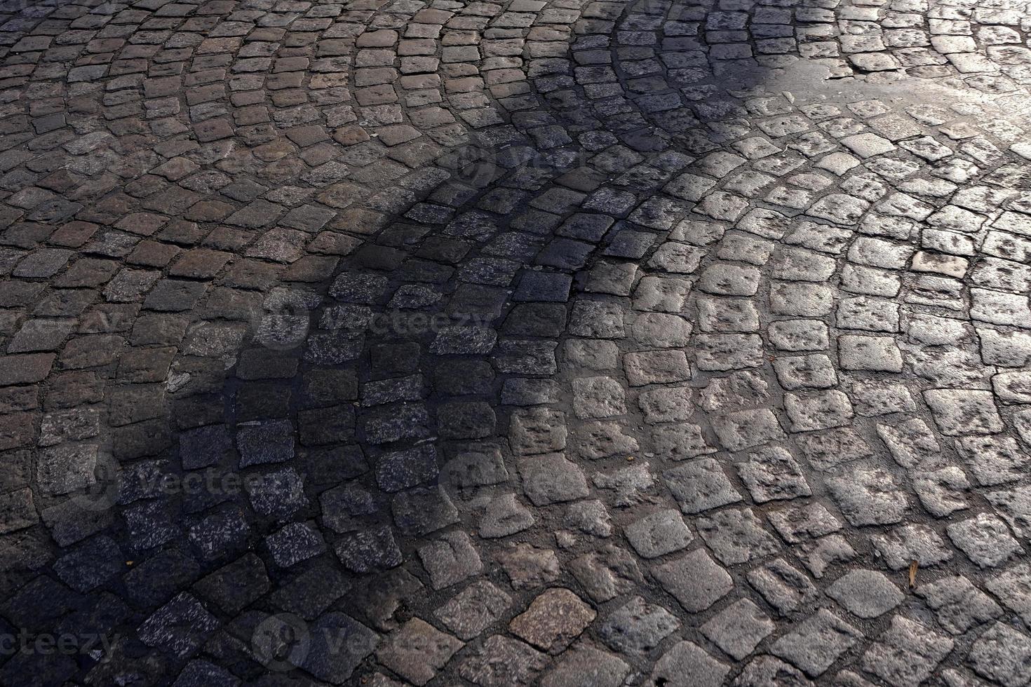 Light Beam and Shadow on Brick Ground. photo