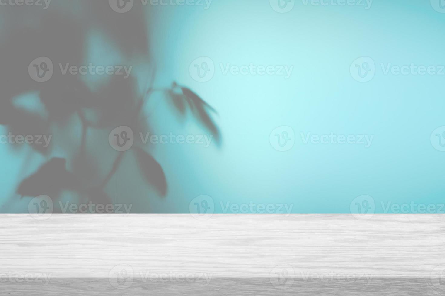 White Wood Table with Frosted Glass and Tree Shadow on Wall Texture Background, Suitable for Product Presentation Backdrop, Display, and Mock up. photo