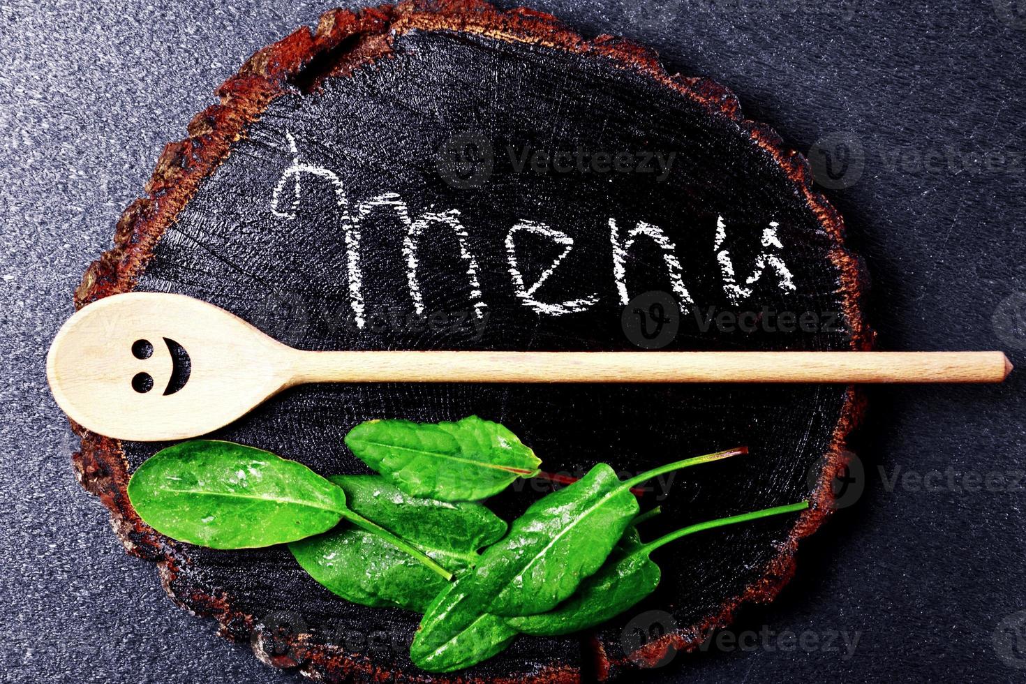 wooden background with an inscription of the menu photo