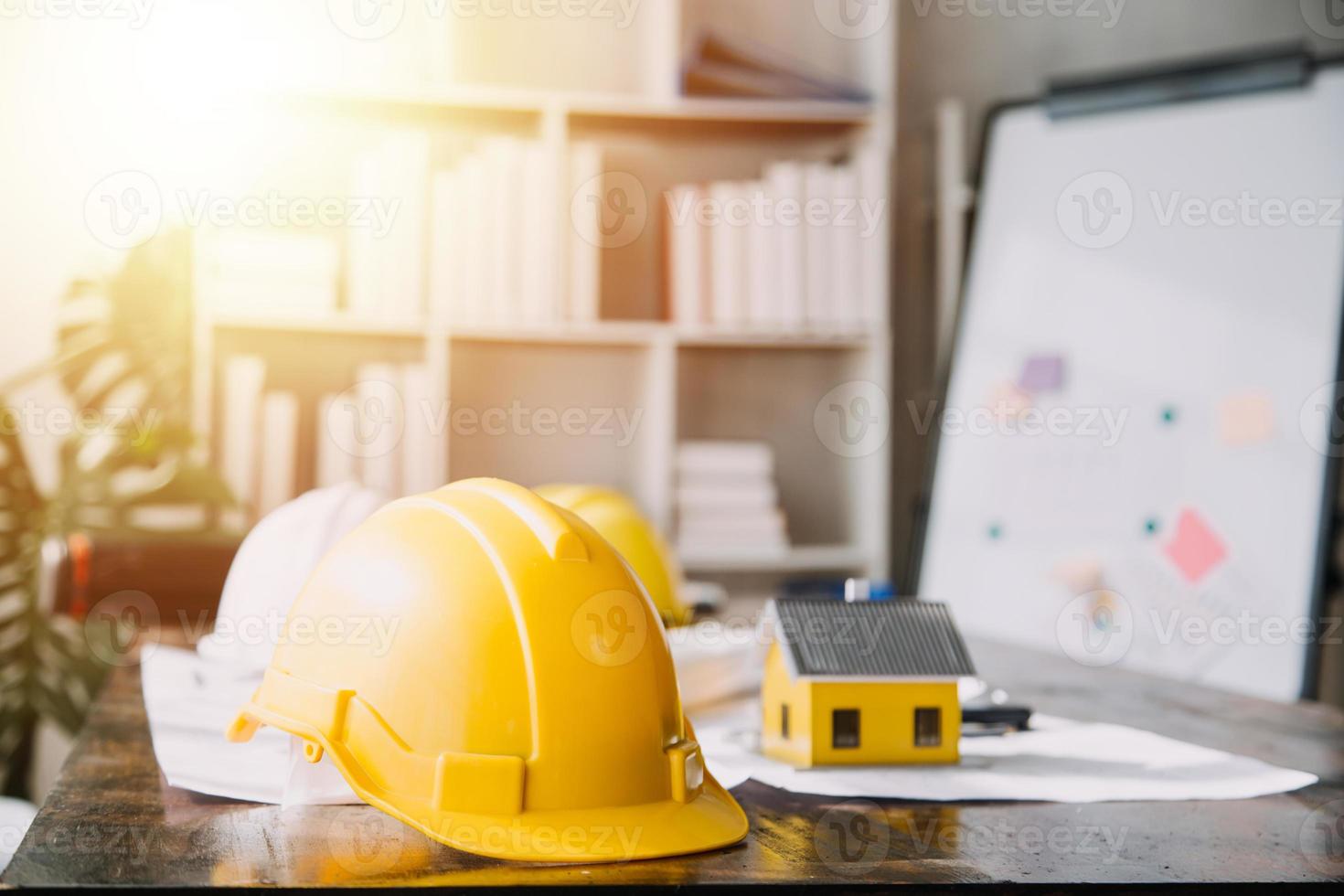 Architect concept, Architects working with blueprints in the office, Vintage Effect photo