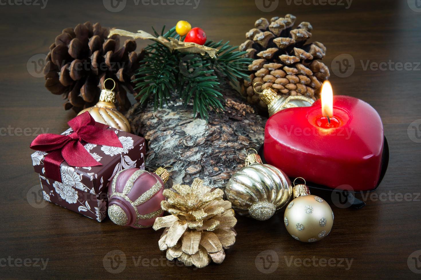 Christmas decoration with christmas baubles and christmas present photo