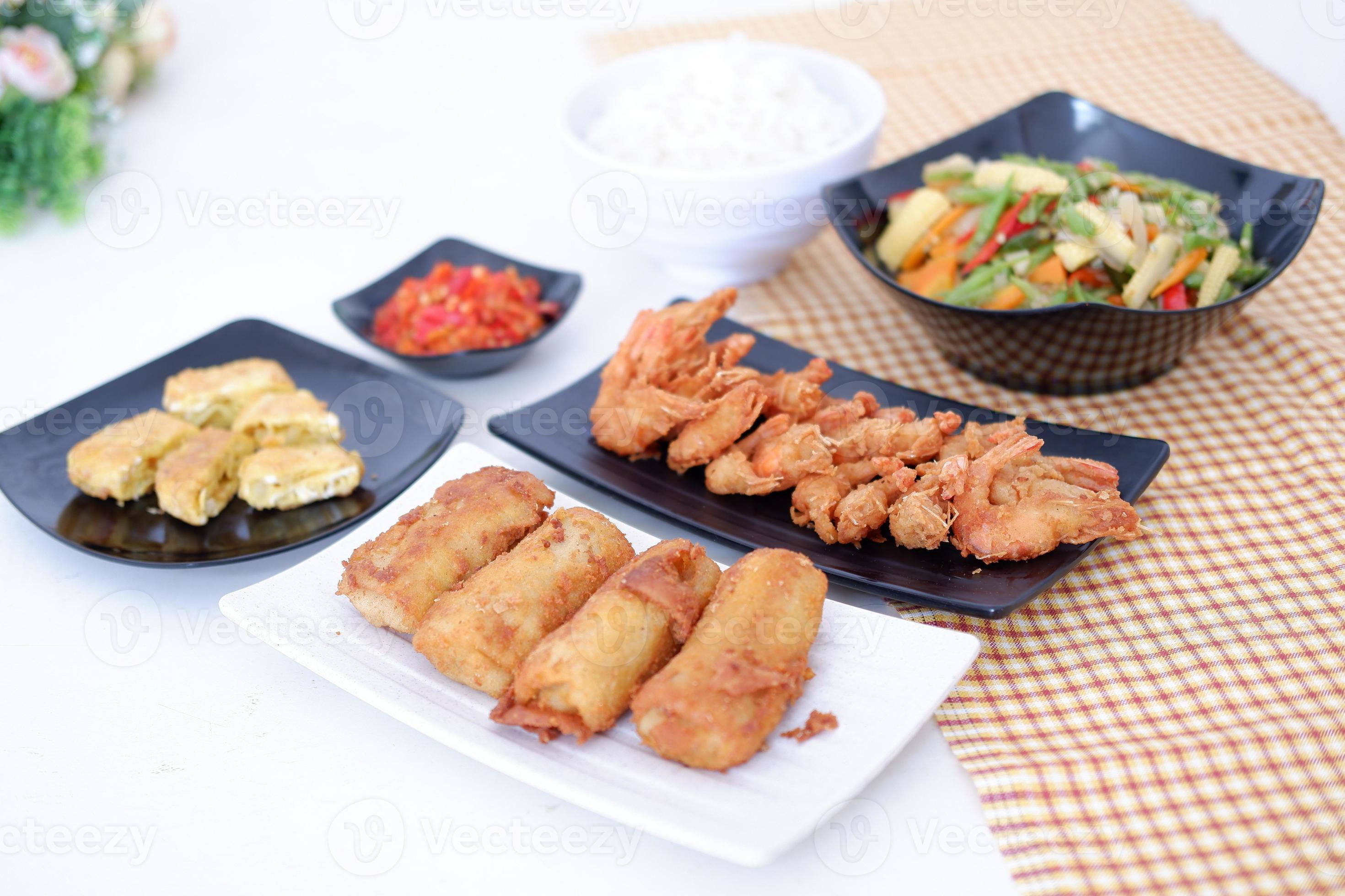 indonesian-food-lunch-menu-rice-with-shrimp-and-side-dishes-19792930