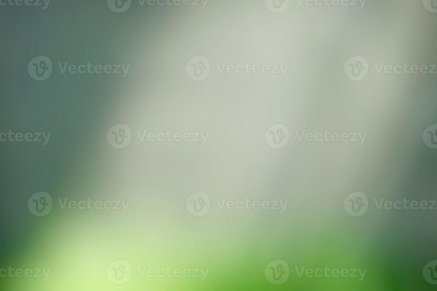 Blurred White Light Beam with Green Light from Bottom Background. photo