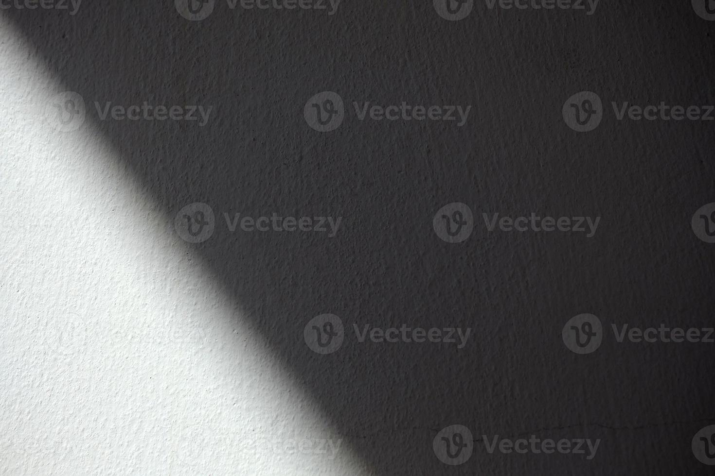 Sunlight Beam on White Concrete Wall Background. photo
