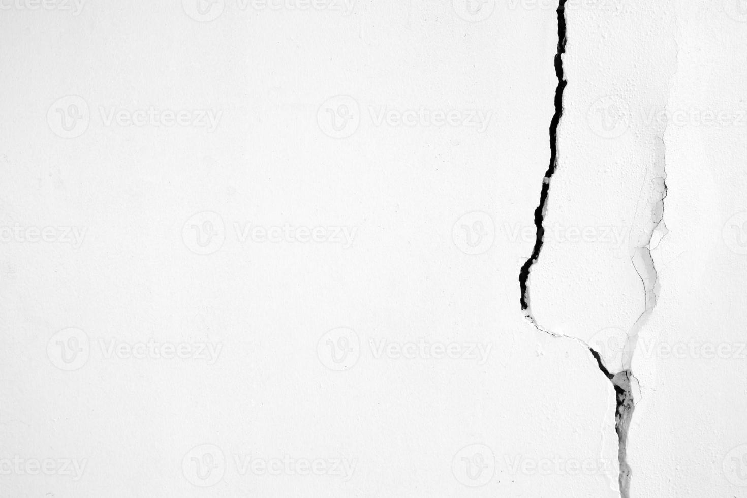 White Cracked Broken Concrete Wall Texture Background. photo