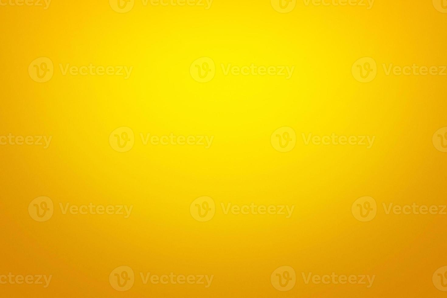Yellow Gold Luxury Gradient Color Background with Light Leak from Top, Suitable for Product Presentation and Backdrop. photo