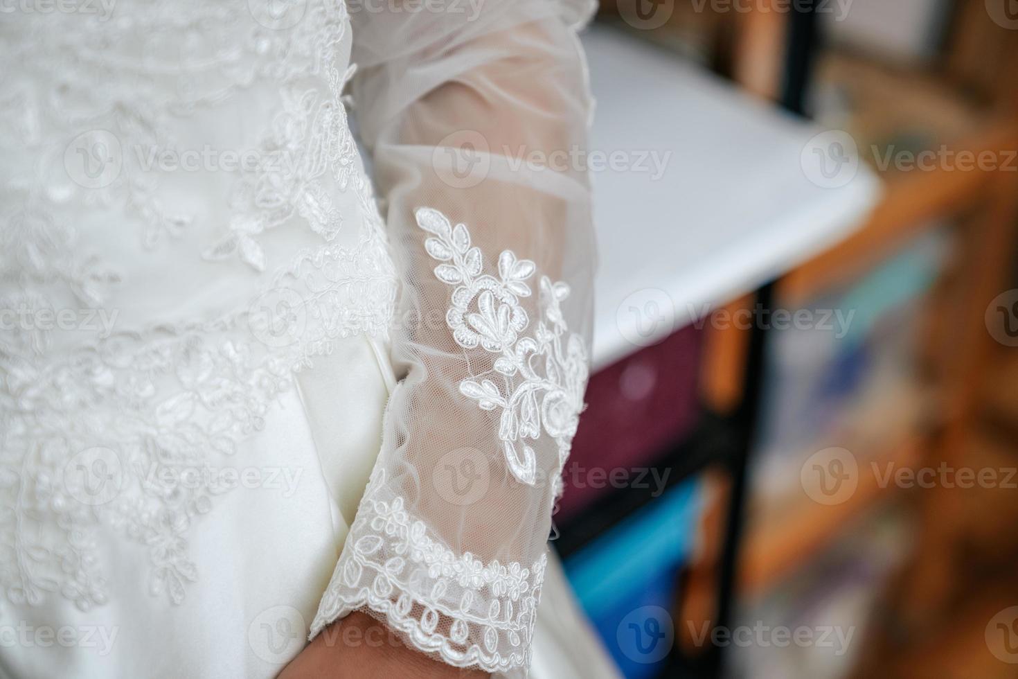 Girl in a wedding dress close-up photo