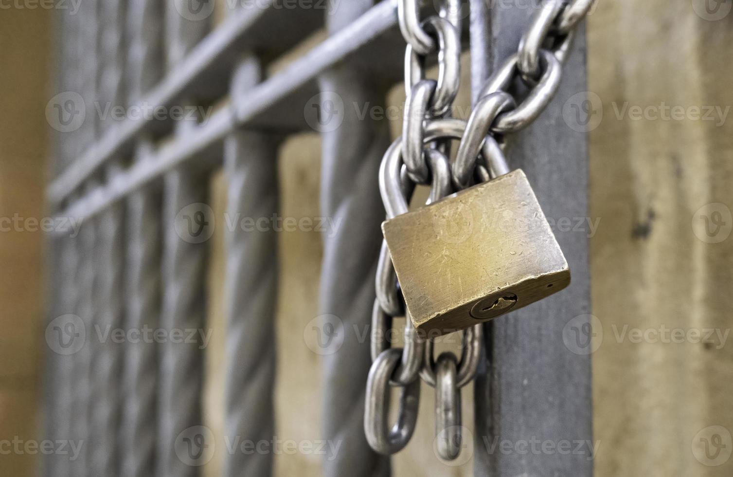 Old padlock with chain photo