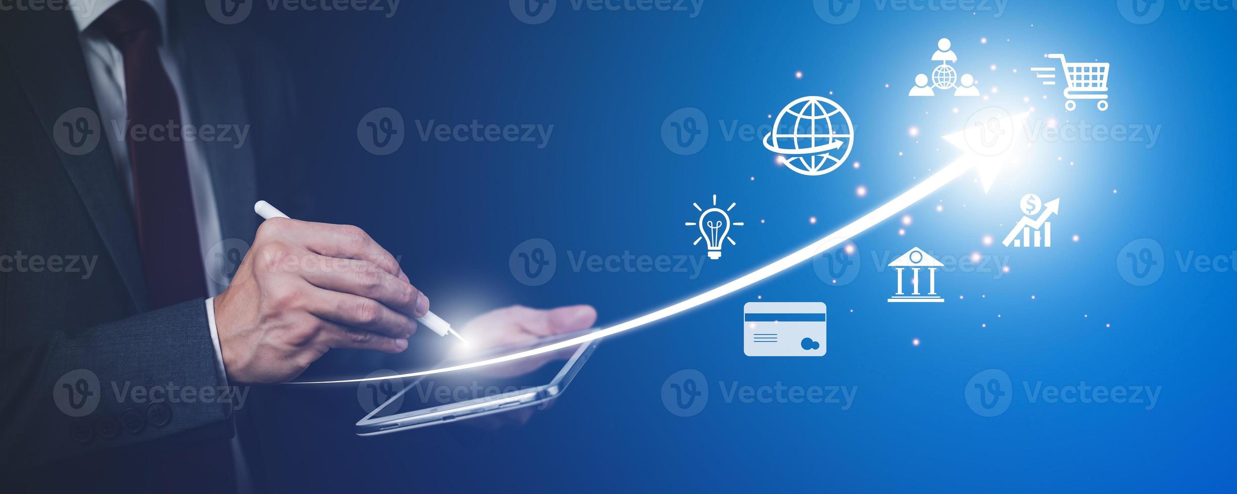 Startup arrow concept with icon business and network connection on modern virtual interface from digital tablet.Businessman Touching tablet and graph Screen Icon of media screen, Technology Process photo