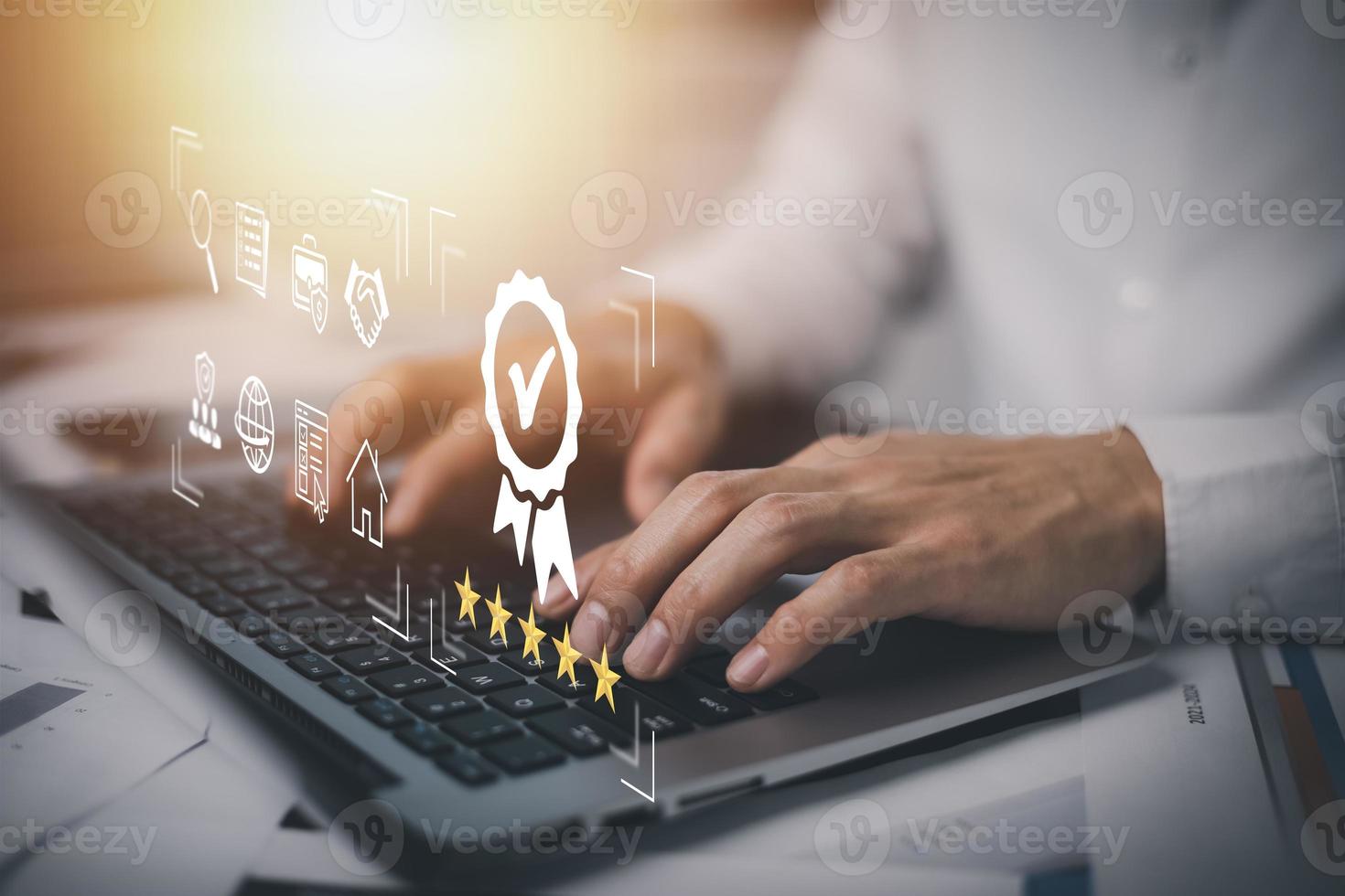 Quality assurance of business services, Businessman Hand shows the sign of the top service Quality assurance in Black background , Guarantee, Standards, ISO certification and standardization concept. photo