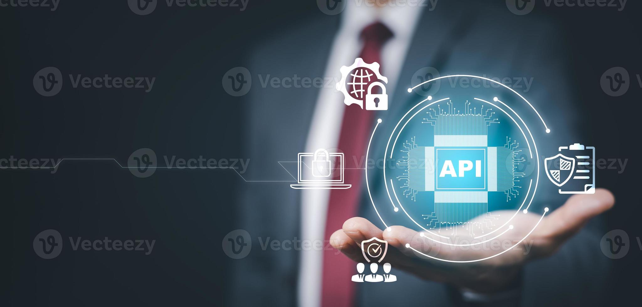 Application Programming Interface Development technology,  Software development, Businessman presses API on virtual screen on the background of technology, modern technology, internet and networking. photo