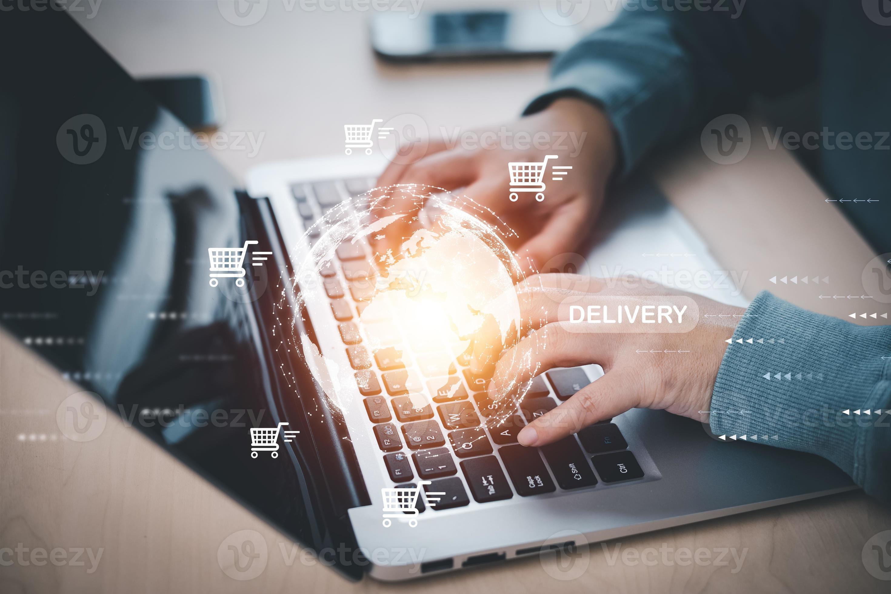 Businessman using a laptop with online shopping concept marketplace