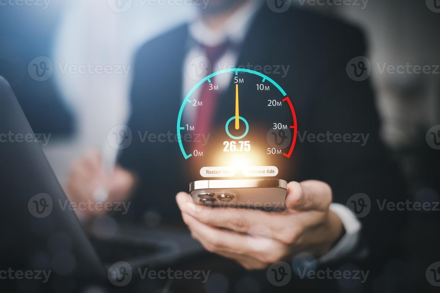 Fast internet connection with Metaverse technology concept, Hand holding smartphone and Virtual screen of Internet speed measurement,Internet and technology concept, 5G Hi speed internet concept photo