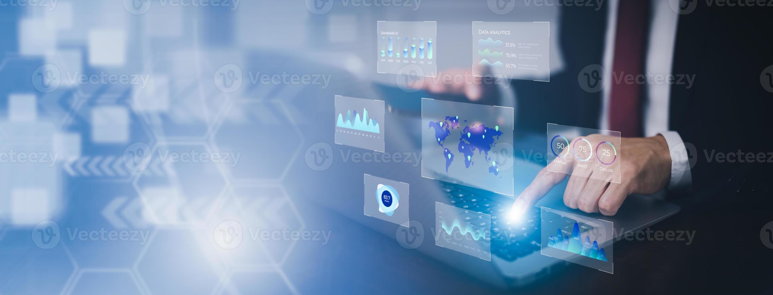 Businessman interacting with laptops, phones, and tablets with featuring stock tickers or graphs, cryptocurrency and new trading platforms, ideas and perspectives, Stock investment,New technology photo