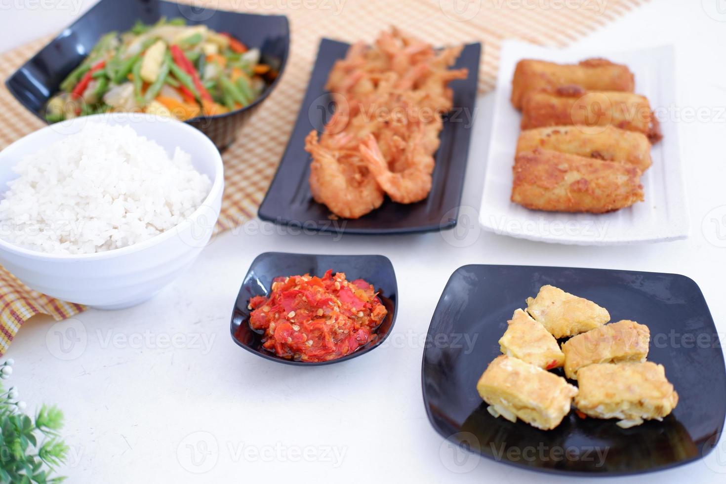 Indonesian food. lunch menu, rice with shrimp and side dishes photo