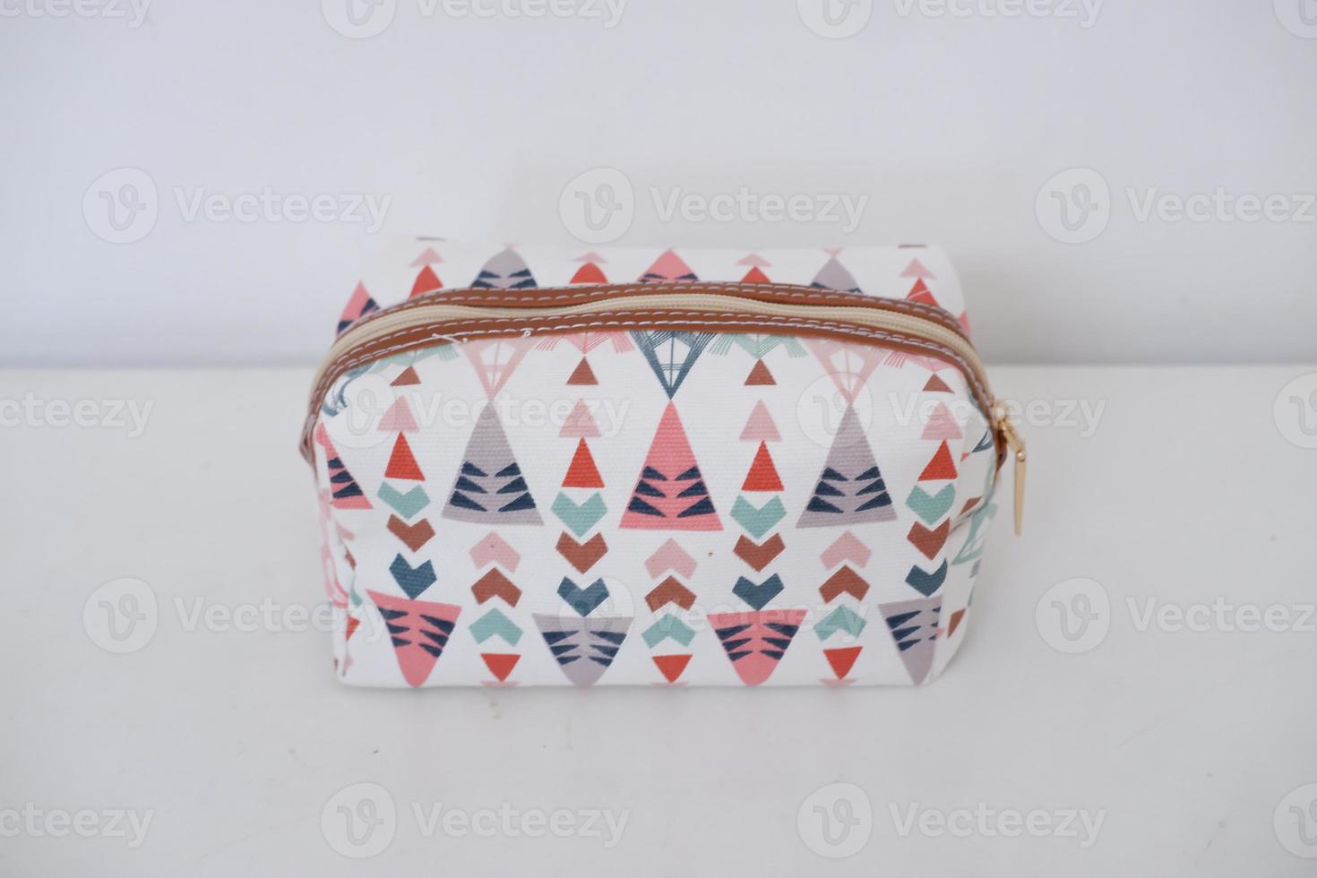 beautiful and patterned pouch as background photo