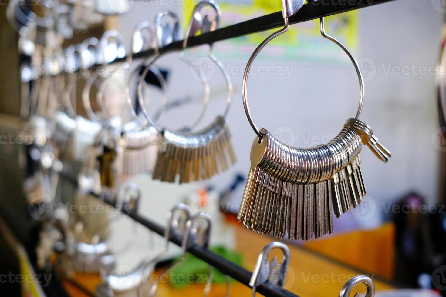 Close up Hanging New Key at Locksmith Shop. photo