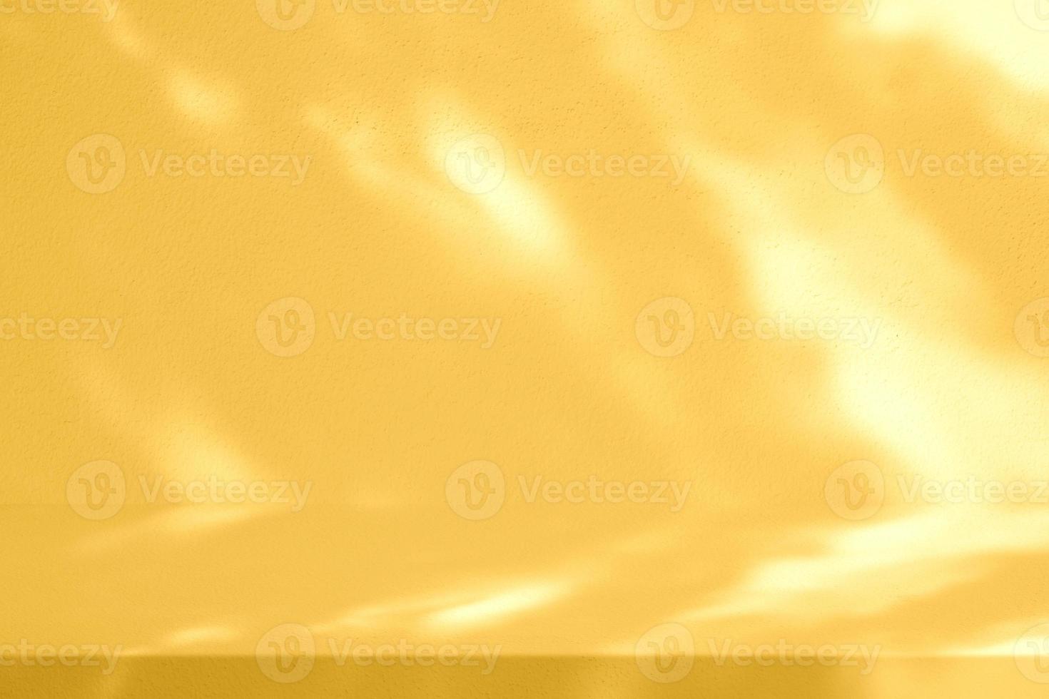 Fortuna Gold Stucco Table with Nature Shadow on Concrete Wall Texture Background, Suitable for Cosmetic Product Presentation Backdrop, Display, and Mock up. photo