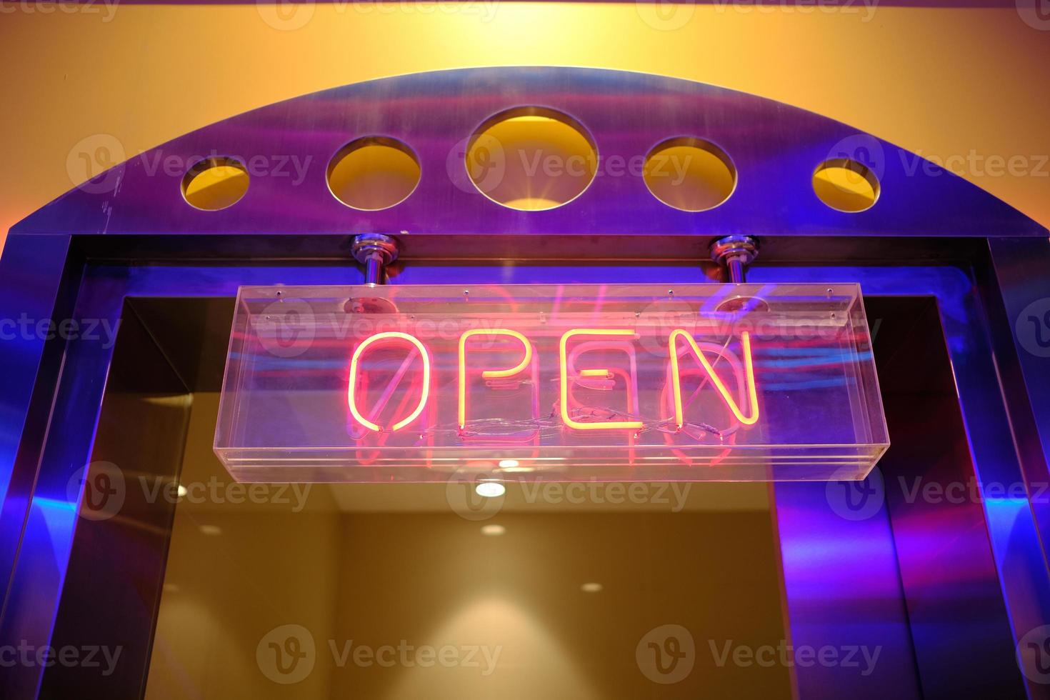 Open Door Sign with Spotlight from the Top. photo