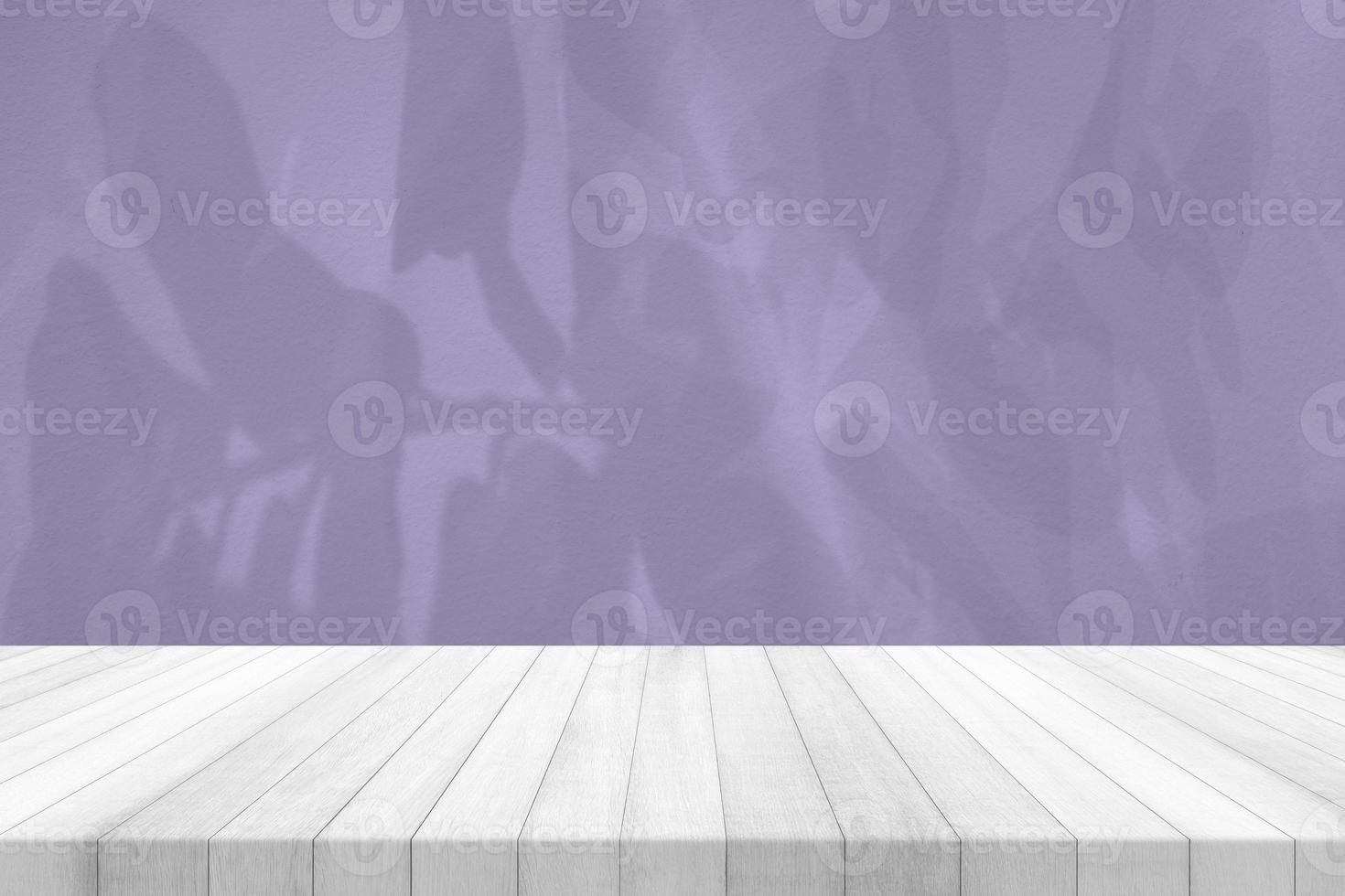 White Wood Table with Leaves Shadow on Digital Lavender Concrete Wall Texture Background, Suitable for Healthy Product Presentation, Backdrop, Display, and Mock up. photo