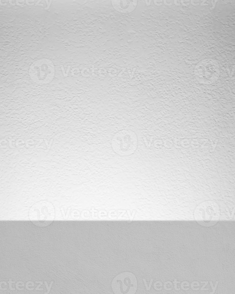 White Concrete Product Stands or Podiums for Straight Line Shot with Spotlight on Stucco Backgroundin Social Media Image Sizes, Suitable for Product Photography Backdrop, Display, and Mock up. photo