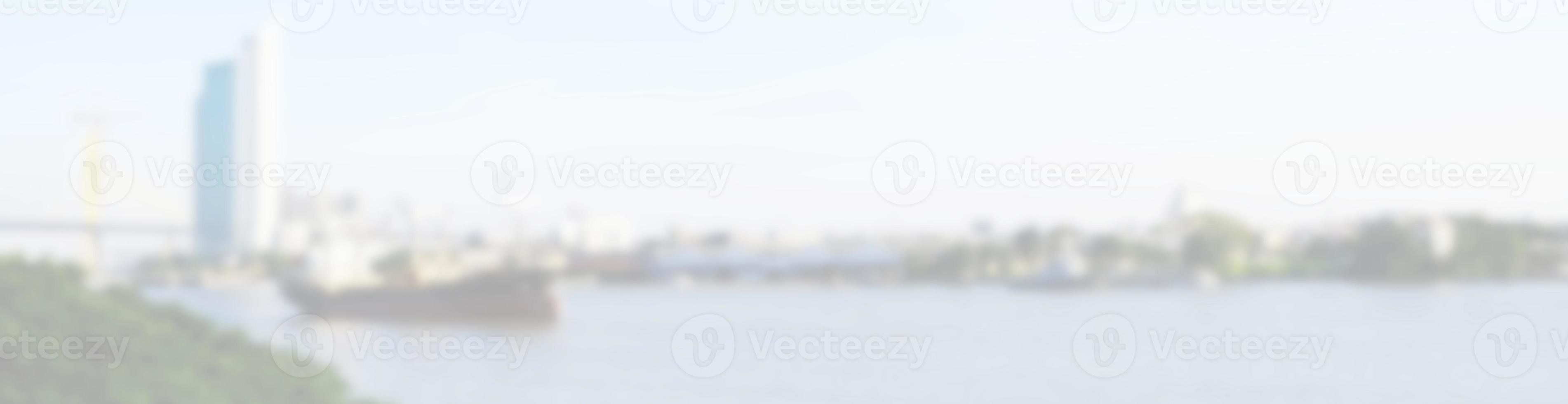 White Blurred Cargo Ship and Skyscraper Background, Suitable for Billboard Header Banner Website. photo