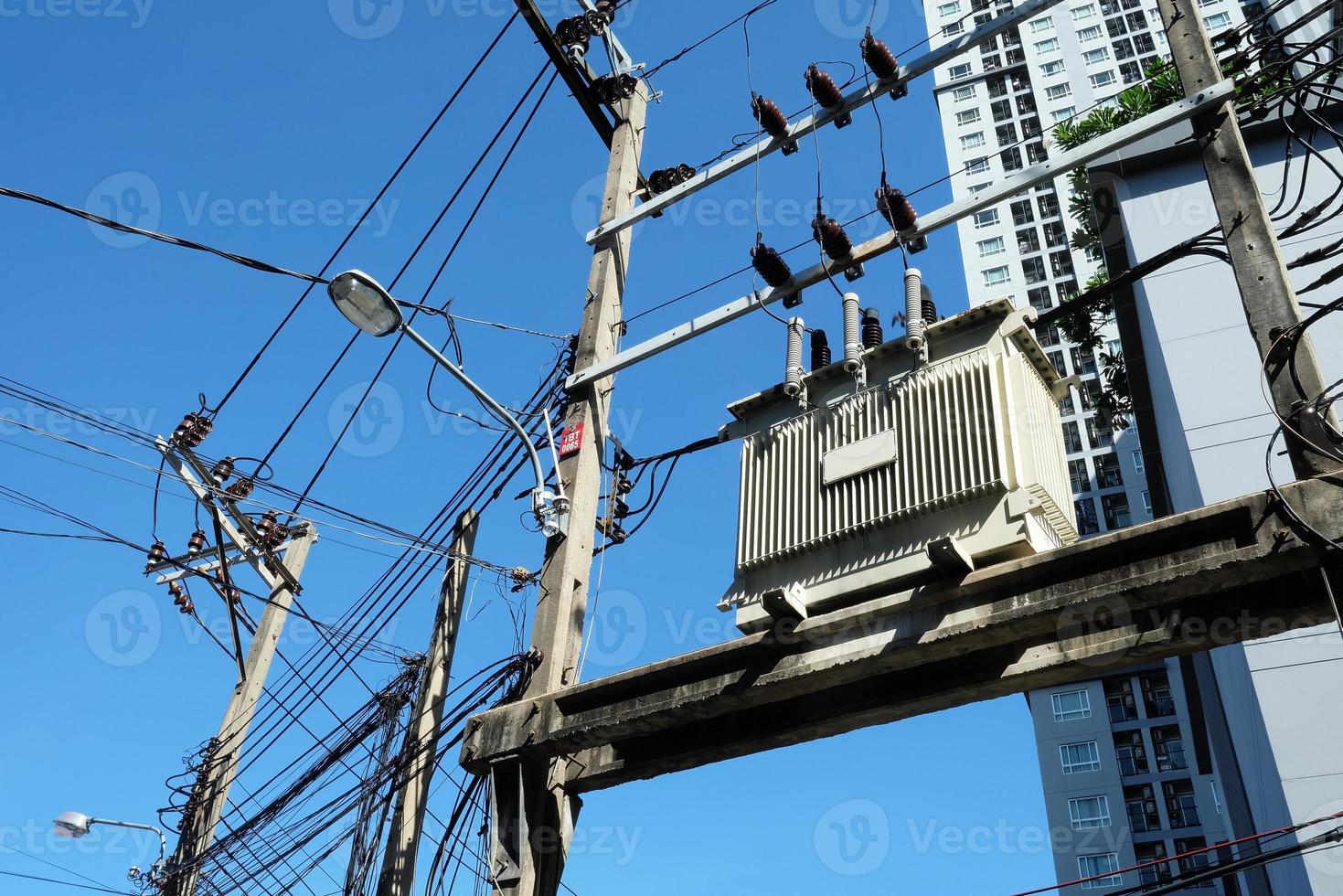 Close up High Voltage Transformer with Blue Sky. photo