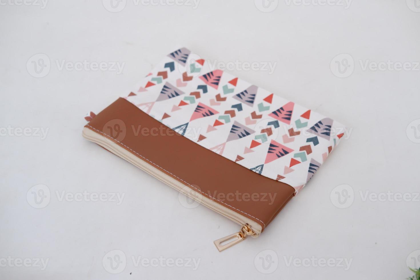 beautiful and patterned pouch as background photo