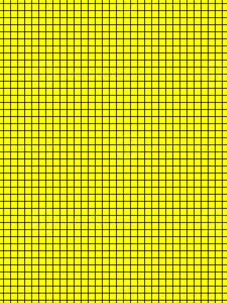 black color graph paper over yellow background photo