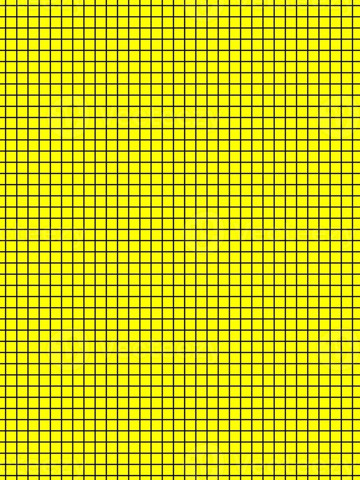 black color graph paper over yellow background photo