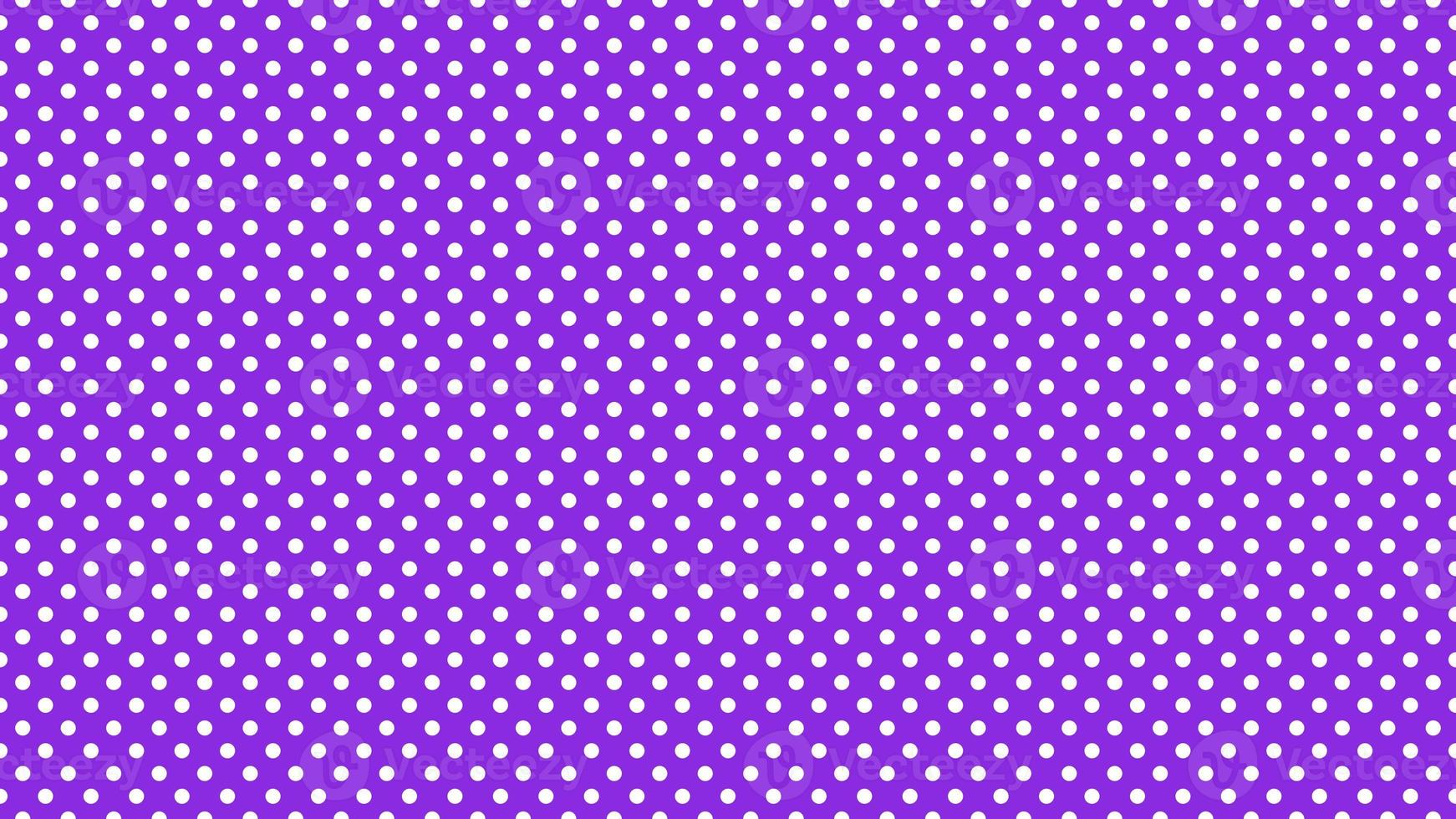 white polka dots over blue violet background photo