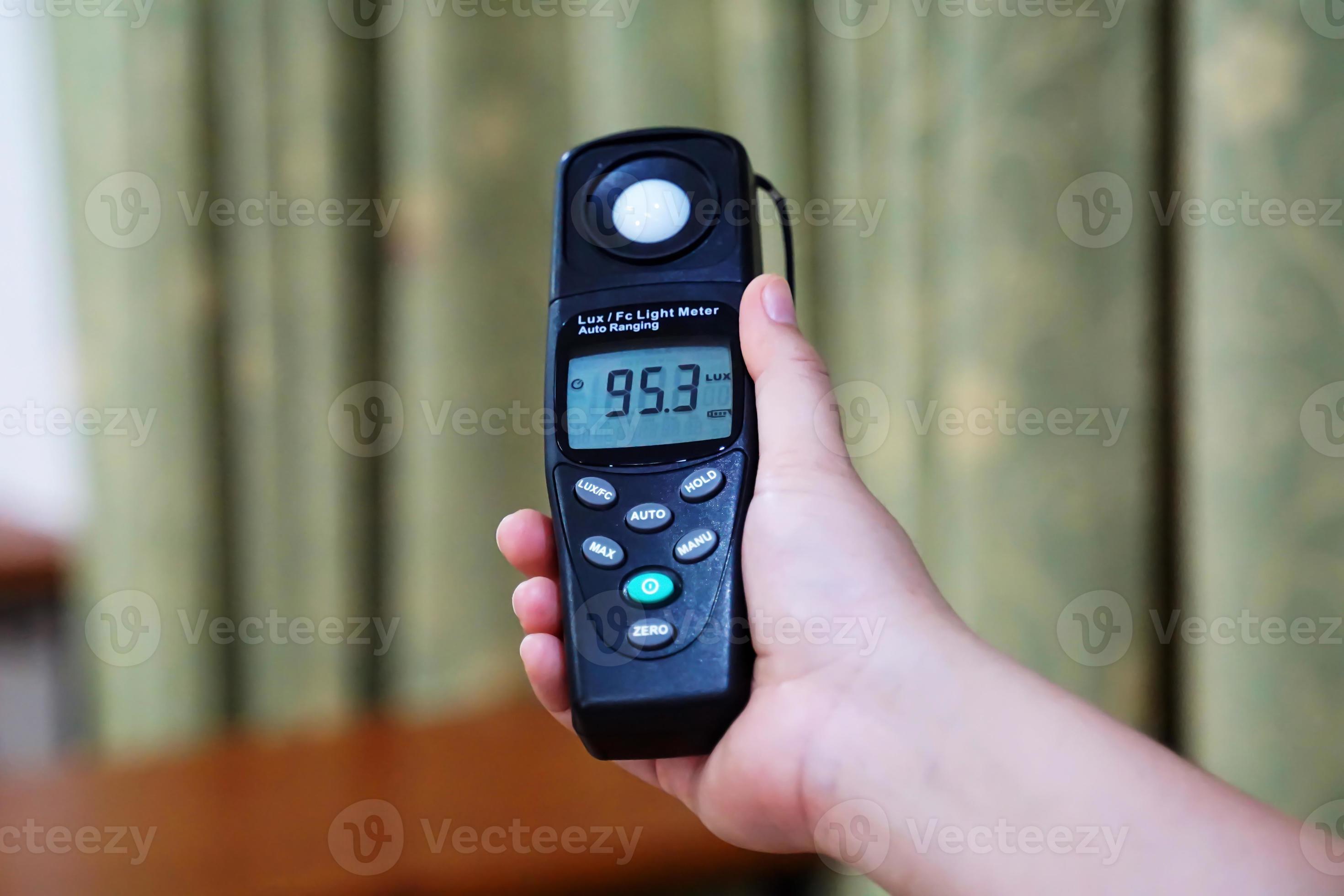 Light meter, Lux Light Meter hold in hand to measure the brightness of