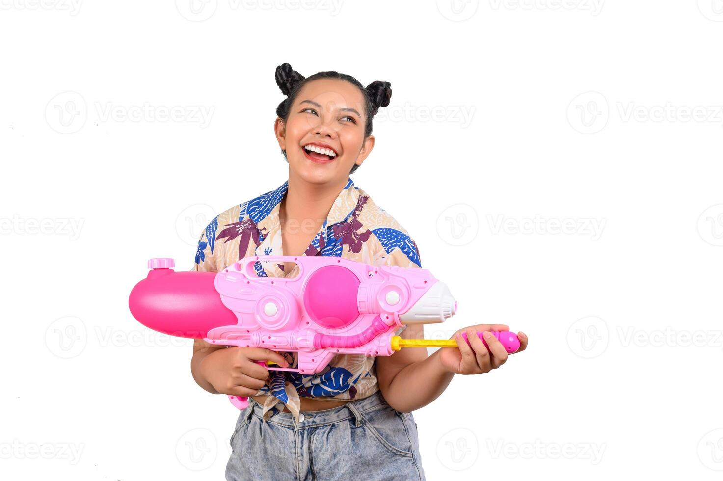 Portrait smiley woman in Songkran festival with water gun photo