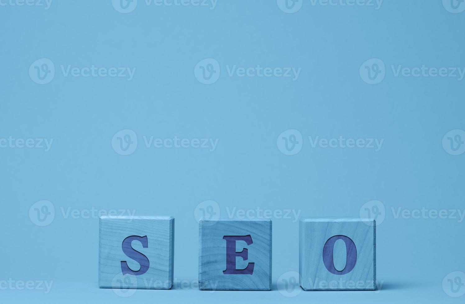 SEO inscription search engine optimization on wooden cubes. photo