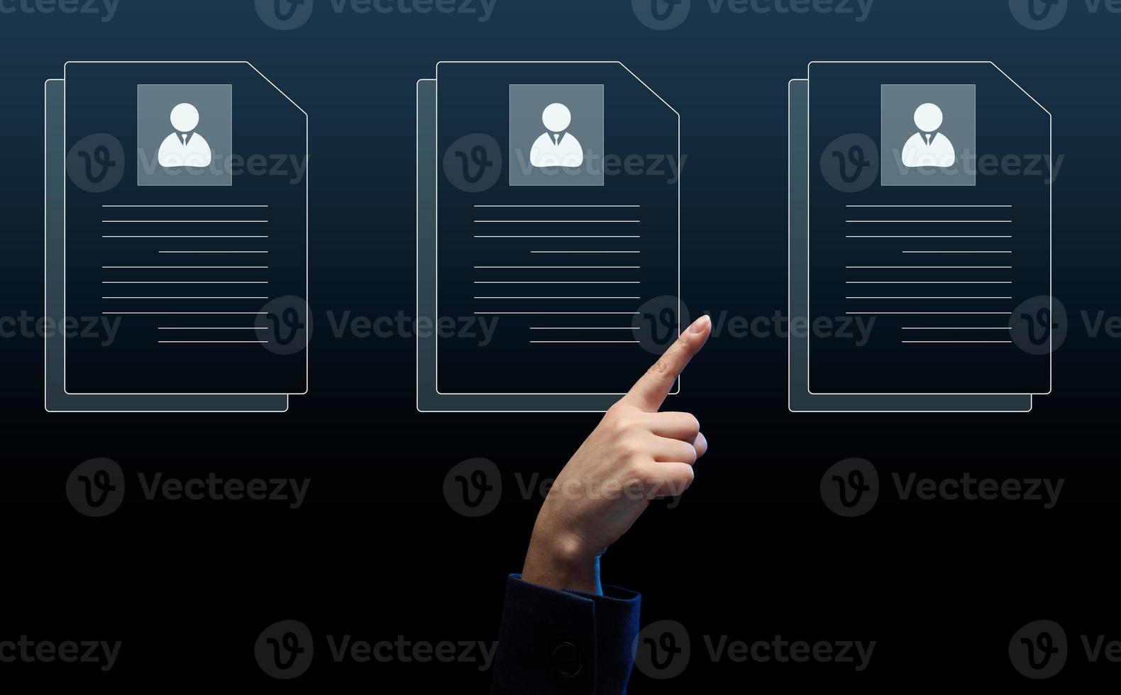 female hand selects a candidate's resume on a virtual screen. The concept of finding employees, career advancement photo
