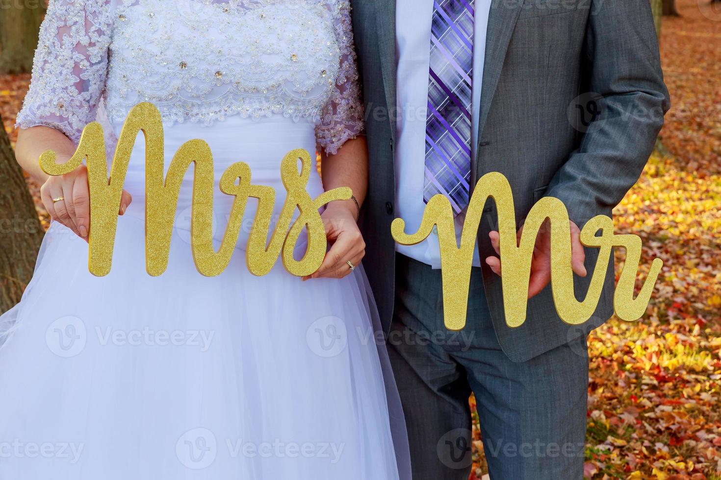 the bride and groom with the words Mr. Mrs. photo