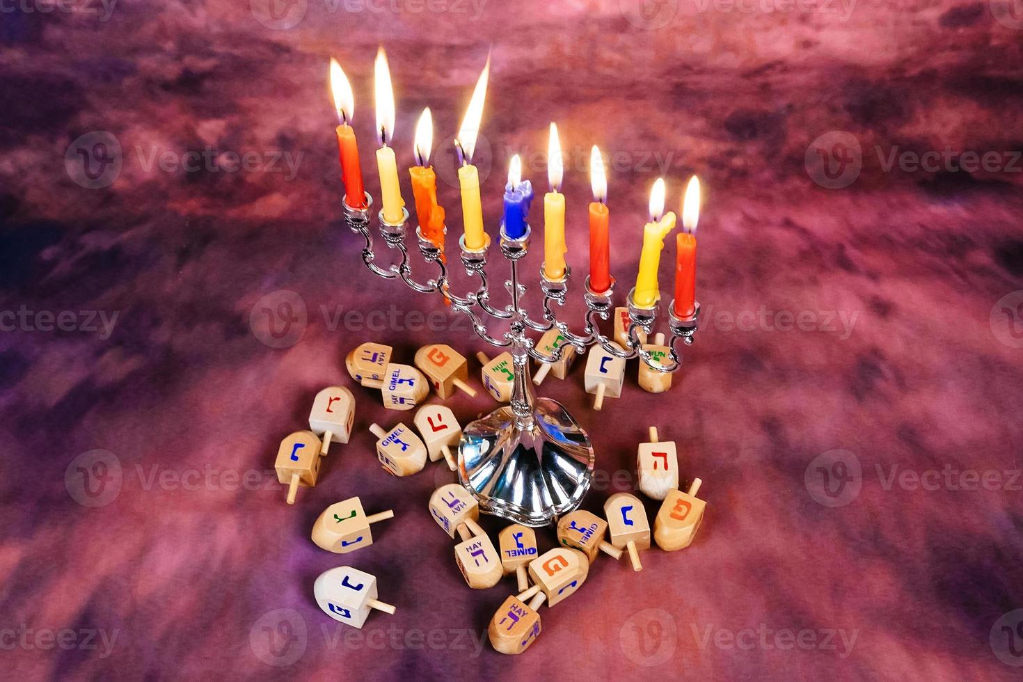Jewish holiday Hanukkah creative background with menorah. View from above focus on . photo